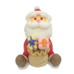 Décor comestible Père Noël assis cadeau (x24)